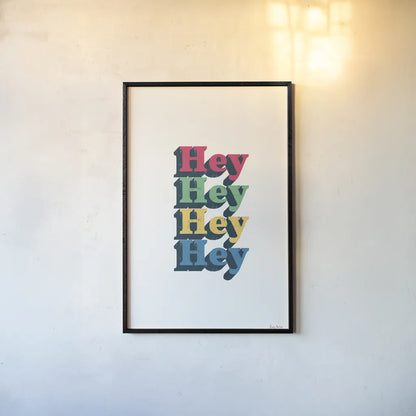 Rainbow Hey Bold by Becky Thorns. shown as a paper print in a black flame. Available as a archival giclee rolled canvas, fine art paper, or poster print. SKU 65210h.