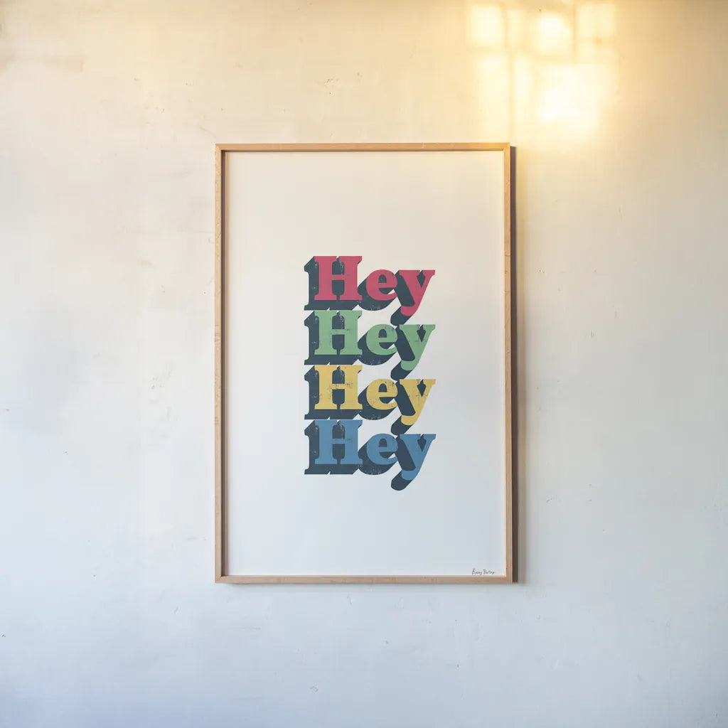Rainbow Hey Bold by Becky Thorns. shown as a paper print in a natural frame. Available as a archival giclee rolled canvas, fine art paper, or poster print. SKU 65210h.