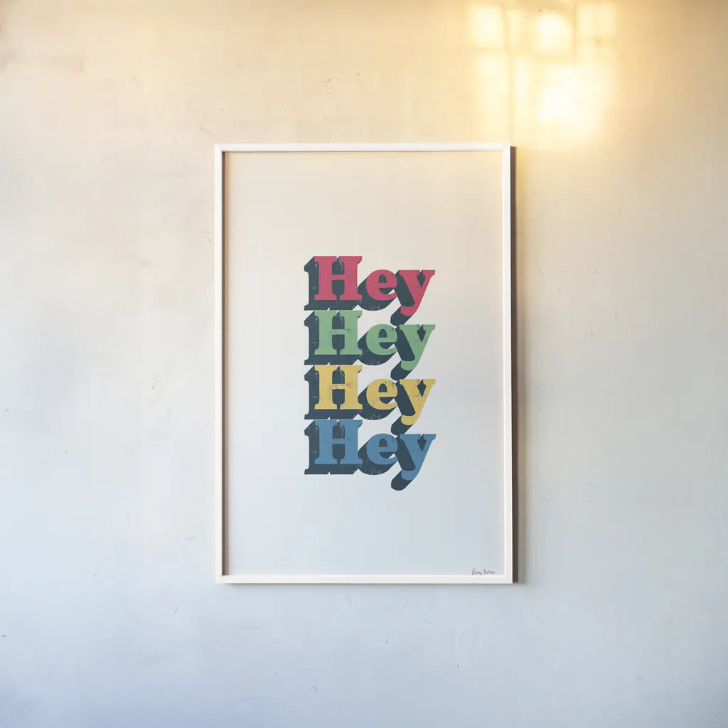 Rainbow Hey Bold by Becky Thorns. shown as a paper print in a white frame. Available as a archival giclee rolled canvas, fine art paper, or poster print. SKU 65210h.