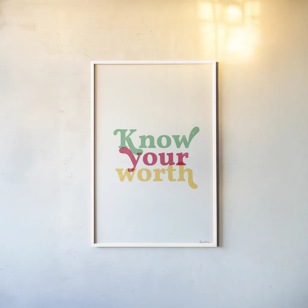 Rainbow Know Your Worth by Becky Thorns. shown as a paper print in a white frame. Available as a archival giclee rolled canvas, fine art paper, or poster print. SKU 65204h.