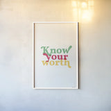 Rainbow Know Your Worth by Becky Thorns. shown as a paper print in a white frame. Available as a archival giclee rolled canvas, fine art paper, or poster print. SKU 65204h.