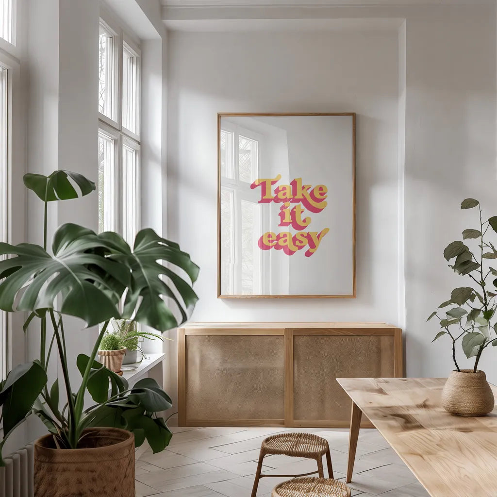 Rainbow Take it Easy Bold by Becky Thorns. shown as a print in a natural wood frame in a dining room. Available as a archival giclee rolled canvas, fine art paper, or poster print. SKU 65220h.