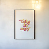 Rainbow Take it Easy Bold by Becky Thorns. shown as a paper print in a black flame. Available as a archival giclee rolled canvas, fine art paper, or poster print. SKU 65220h.