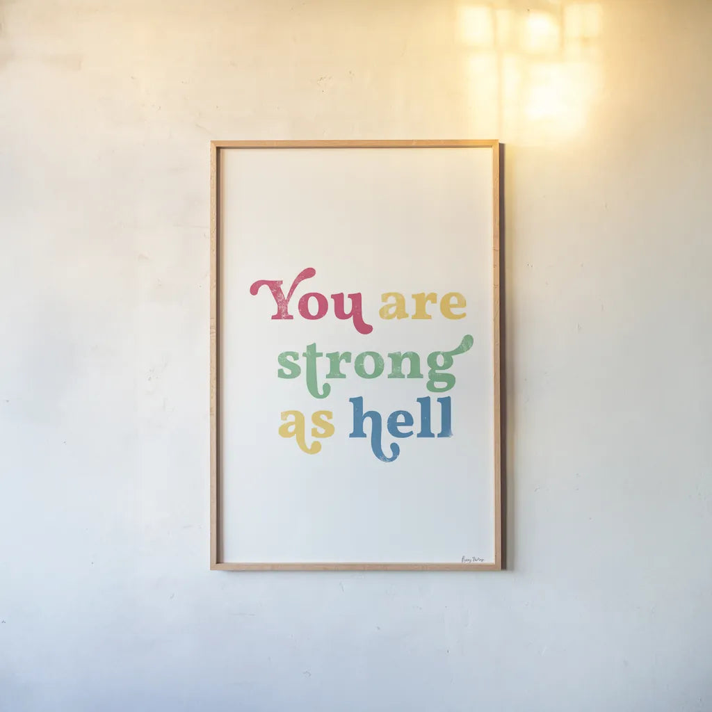Rainbow You Are Strong by Becky Thorns. shown as a paper print in a natural frame. Available as a archival giclee rolled canvas, fine art paper, or poster print. SKU 65206h.