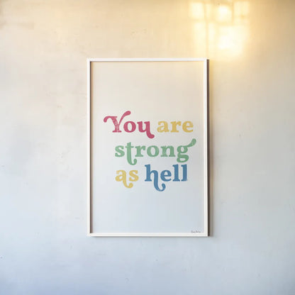 Rainbow You Are Strong by Becky Thorns. shown as a paper print in a white frame. Available as a archival giclee rolled canvas, fine art paper, or poster print. SKU 65206h.