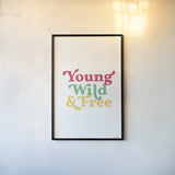 Rainbow Young Wild and Free by Becky Thorns. shown as a paper print in a black flame. Available as a archival giclee rolled canvas, fine art paper, or poster print. SKU 65207h.
