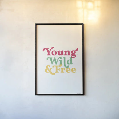 Rainbow Young Wild and Free by Becky Thorns. shown as a paper print in a black flame. Available as a archival giclee rolled canvas, fine art paper, or poster print. SKU 65207h.