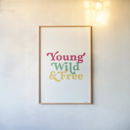 Rainbow Young Wild and Free by Becky Thorns. shown as a paper print in a natural frame. Available as a archival giclee rolled canvas, fine art paper, or poster print. SKU 65207h.