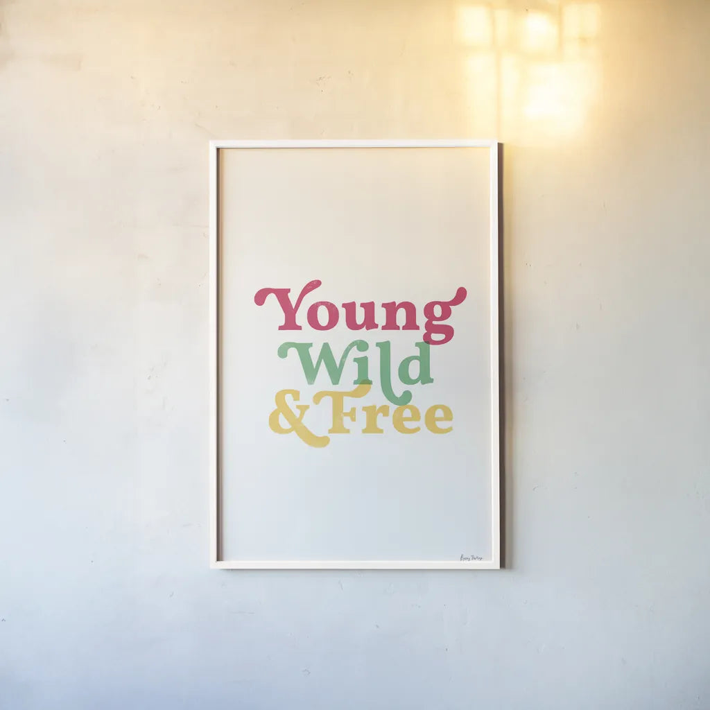 Rainbow Young Wild and Free by Becky Thorns. shown as a paper print in a white frame. Available as a archival giclee rolled canvas, fine art paper, or poster print. SKU 65207h.