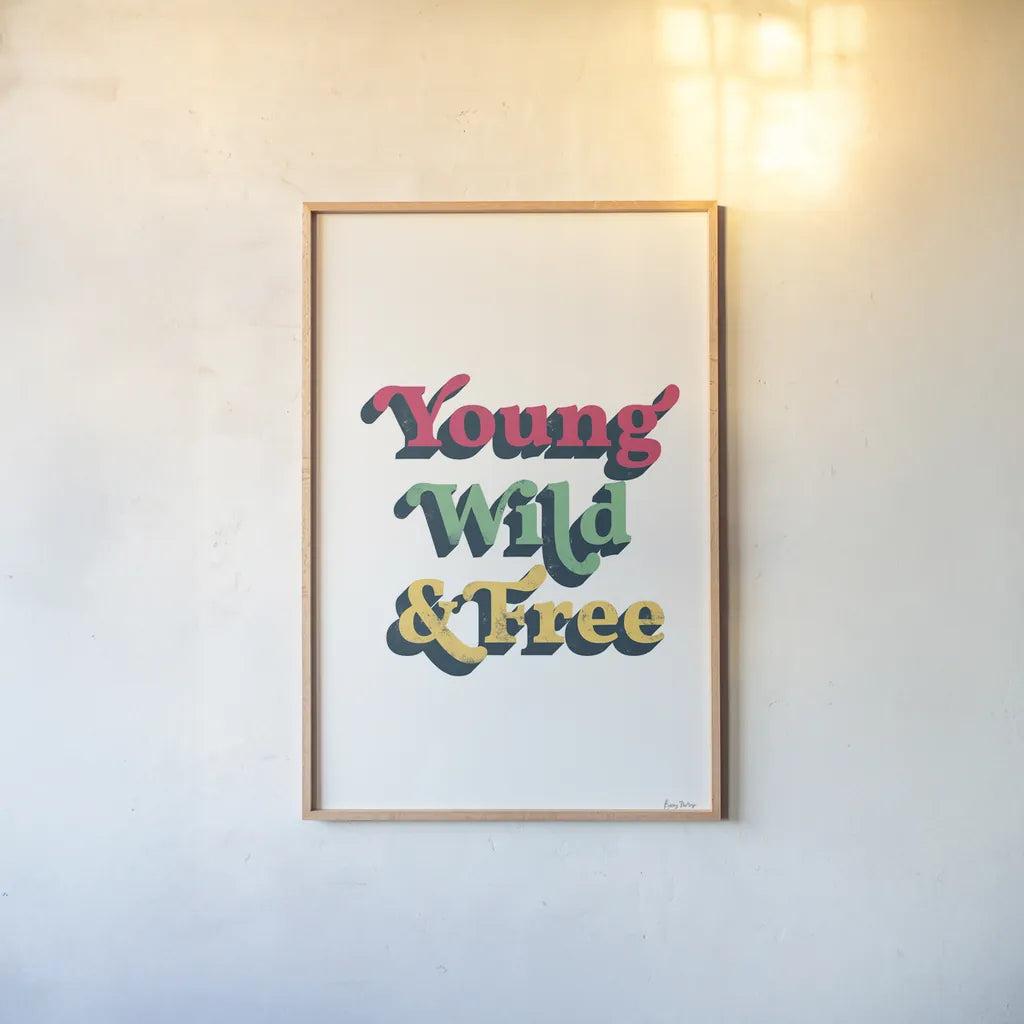 Rainbow Young Wild and Free Bold by Becky Thorns. shown as a paper print in a natural frame. Available as a archival giclee rolled canvas, fine art paper, or poster print. SKU 65219h.