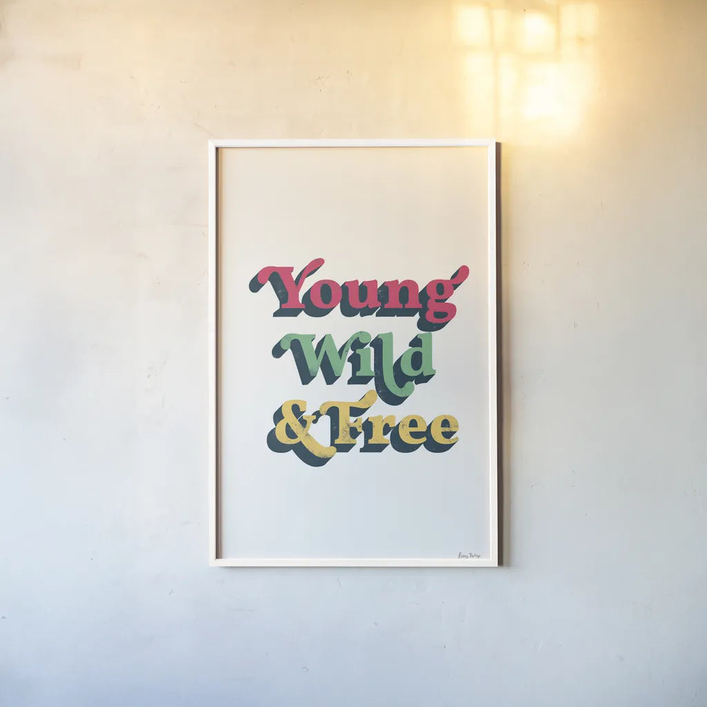 Rainbow Young Wild and Free Bold by Becky Thorns. shown as a paper print in a white frame. Available as a archival giclee rolled canvas, fine art paper, or poster print. SKU 65219h.