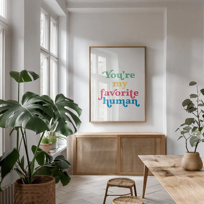 Rainbow Youre My Favorite by Becky Thorns. shown as a print in a natural wood frame in a dining room. Available as a archival giclee rolled canvas, fine art paper, or poster print. SKU 65209h.