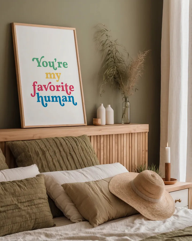 Rainbow Youre My Favorite by Becky Thorns. shown as a paper print in a natural frame. Available as a archival giclee rolled canvas, fine art paper, or poster print. SKU 65209h.