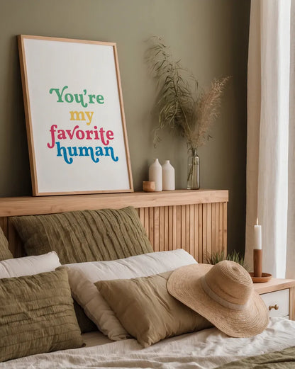 Rainbow Youre My Favorite by Becky Thorns. shown as a paper print in a natural frame. Available as a archival giclee rolled canvas, fine art paper, or poster print. SKU 65209h.