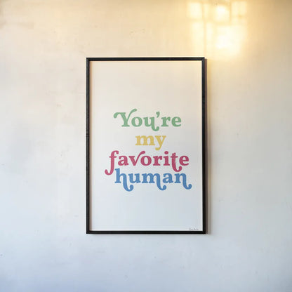 Rainbow Youre My Favorite by Becky Thorns. shown as a paper print in a black flame. Available as a archival giclee rolled canvas, fine art paper, or poster print. SKU 65209h.