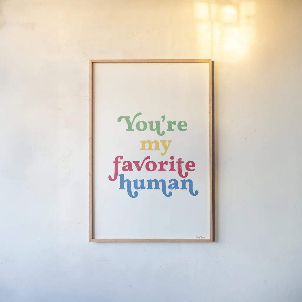 Rainbow Youre My Favorite by Becky Thorns. shown as a paper print in a natural frame. Available as a archival giclee rolled canvas, fine art paper, or poster print. SKU 65209h.