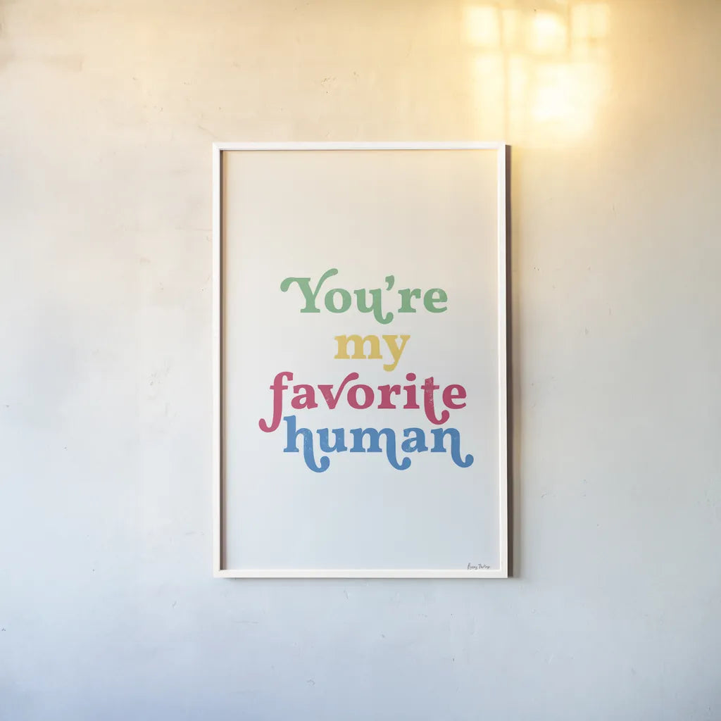 Rainbow Youre My Favorite by Becky Thorns. shown as a paper print in a white frame. Available as a archival giclee rolled canvas, fine art paper, or poster print. SKU 65209h.