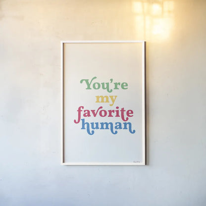 Rainbow Youre My Favorite by Becky Thorns. shown as a paper print in a white frame. Available as a archival giclee rolled canvas, fine art paper, or poster print. SKU 65209h.