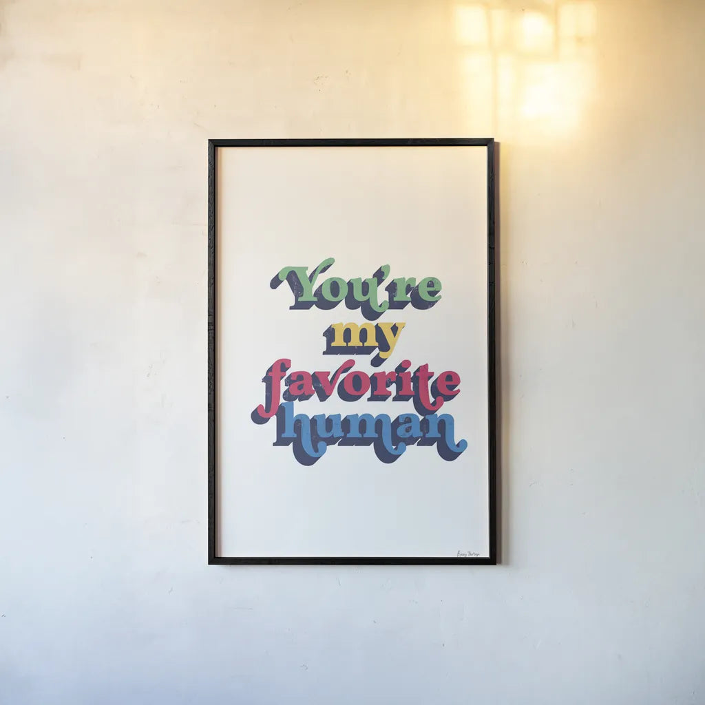 Rainbow Youre My Favorite Bold by Becky Thorns. shown as a paper print in a black flame. Available as a archival giclee rolled canvas, fine art paper, or poster print. SKU 65221h.