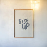 Rise Up II Neutral by Becky Thorns. shown as a paper print in a natural frame. Available as a archival giclee rolled canvas, fine art paper, or poster print. SKU 72486h.