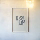 Rise Up II Neutral by Becky Thorns. shown as a paper print in a white frame. Available as a archival giclee rolled canvas, fine art paper, or poster print. SKU 72486h.