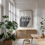 Rise and Grind BW by Becky Thorns. shown as a print in a natural wood frame in a dining room. Available as a archival giclee rolled canvas, fine art paper, or poster print. SKU 59633h.