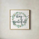 Sage Sayings Wreath III by Becky Thorns. Shown in a natural wood glass frame for a timeless modern aesthetic. Available as an archival giclee rolled canvas, fine art paper, or poster print. SKU 68252a.