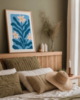 Scandi Flowers I by Becky Thorns. shown as a paper print in a natural frame. Available as a archival giclee rolled canvas, fine art paper, or poster print. SKU 96666h.