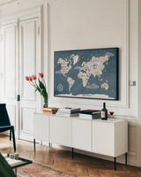 ScandiMap I Blue by Becky Thorns. shown as a framed stretched canvas in a living room above a console. Available as a archival giclee rolled canvas, fine art paper, or poster print. SKU 64484i.
