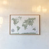 ScandiMap I White by Becky Thorns. shown as a paper print in a natural frame. Available as a archival giclee rolled canvas, fine art paper, or poster print. SKU 64485i.