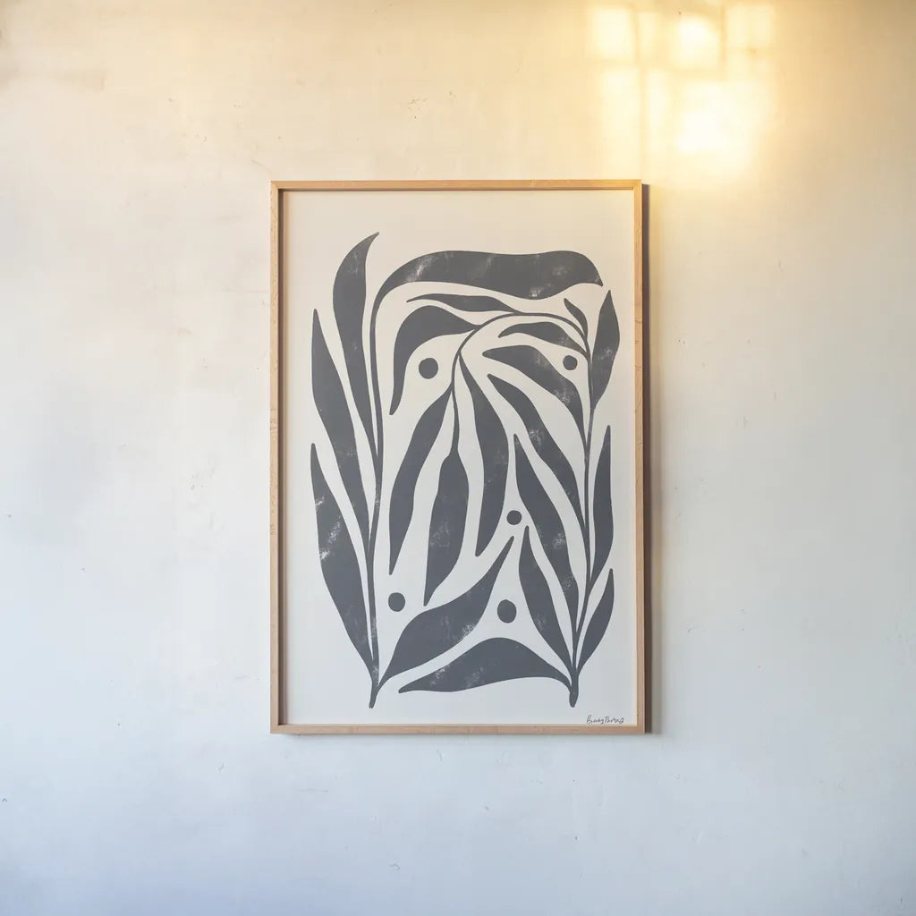 Simple Botanical I by Becky Thorns. shown as a paper print in a natural frame. Available as a archival giclee rolled canvas, fine art paper, or poster print. SKU 87469h.