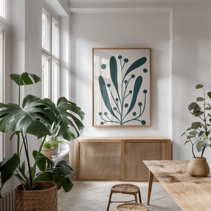 Simple Botanical IV Green by Becky Thorns. shown as a print in a natural wood frame in a dining room. Available as a archival giclee rolled canvas, fine art paper, or poster print. SKU 88494h.