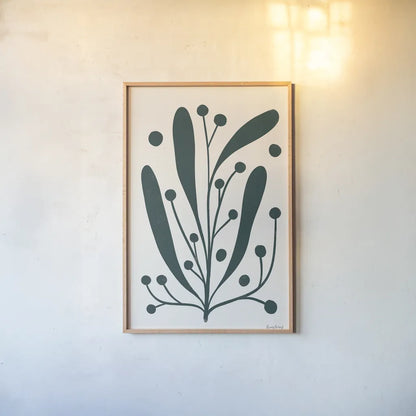 Simple Botanical IV Green by Becky Thorns. shown as a paper print in a natural frame. Available as a archival giclee rolled canvas, fine art paper, or poster print. SKU 88494h.