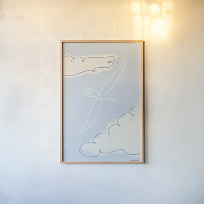 Soaring Seagull I by Becky Thorns. shown as a paper print in a natural frame. Available as a archival giclee rolled canvas, fine art paper, or poster print. SKU 87641h.