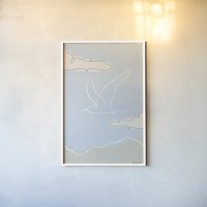 Soaring Seagull II by Becky Thorns. shown as a paper print in a white frame. Available as a archival giclee rolled canvas, fine art paper, or poster print. SKU 87642h.