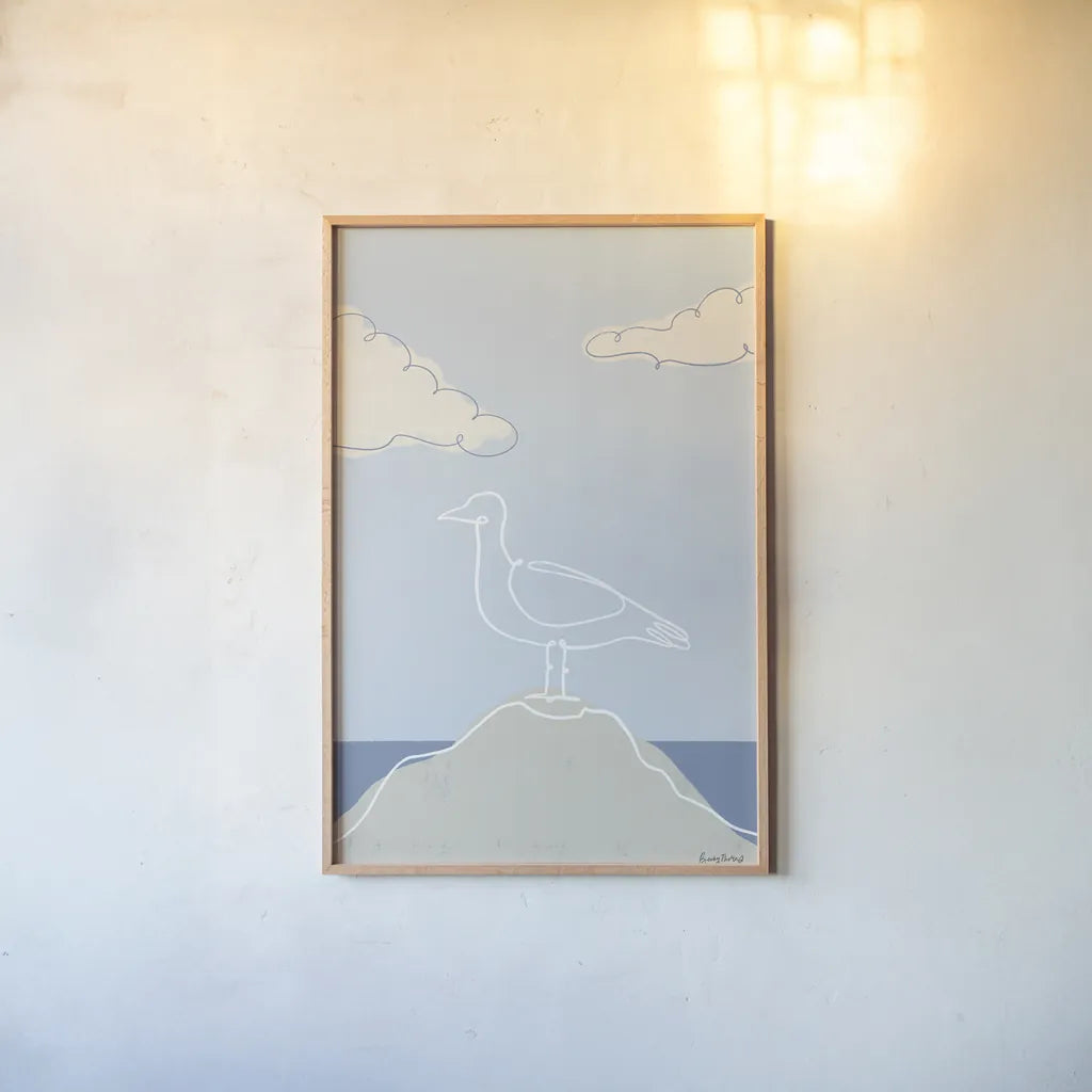 Soaring Seagull IV by Becky Thorns. shown as a paper print in a natural frame. Available as a archival giclee rolled canvas, fine art paper, or poster print. SKU 87644h.