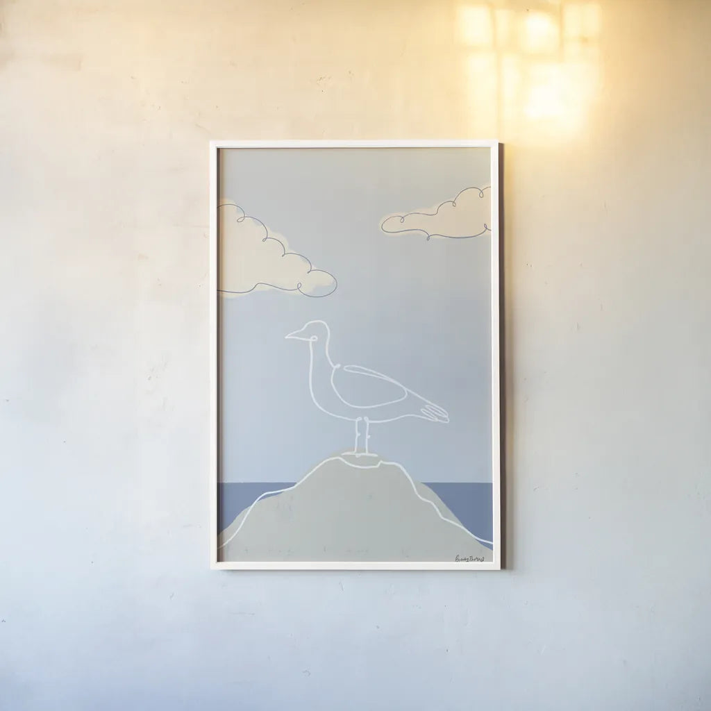 Soaring Seagull IV by Becky Thorns. shown as a paper print in a white frame. Available as a archival giclee rolled canvas, fine art paper, or poster print. SKU 87644h.