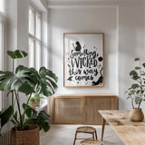 Sophisticated Spooky IV BW by Becky Thorns. shown as a print in a natural wood frame in a dining room. Available as a archival giclee rolled canvas, fine art paper, or poster print. SKU 67891h.