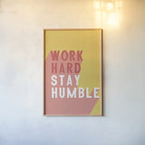 Work Hard Stay Humble by Becky Thorns. shown as a paper print in a natural frame. Available as a archival giclee rolled canvas, fine art paper, or poster print. SKU 56778h.