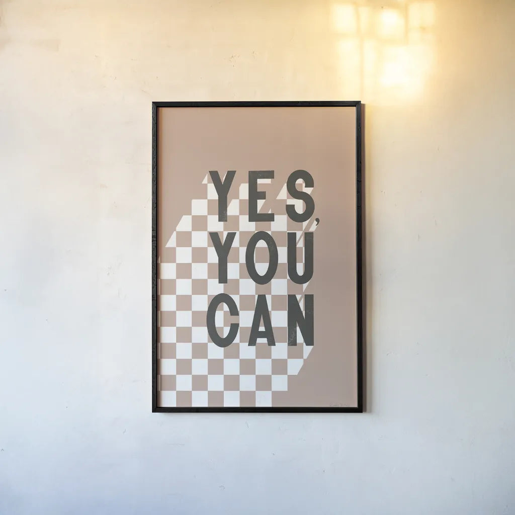 Yes You Can Checkered by Becky Thorns. shown as a paper print in a black flame. Available as a archival giclee rolled canvas, fine art paper, or poster print. SKU 87462h.