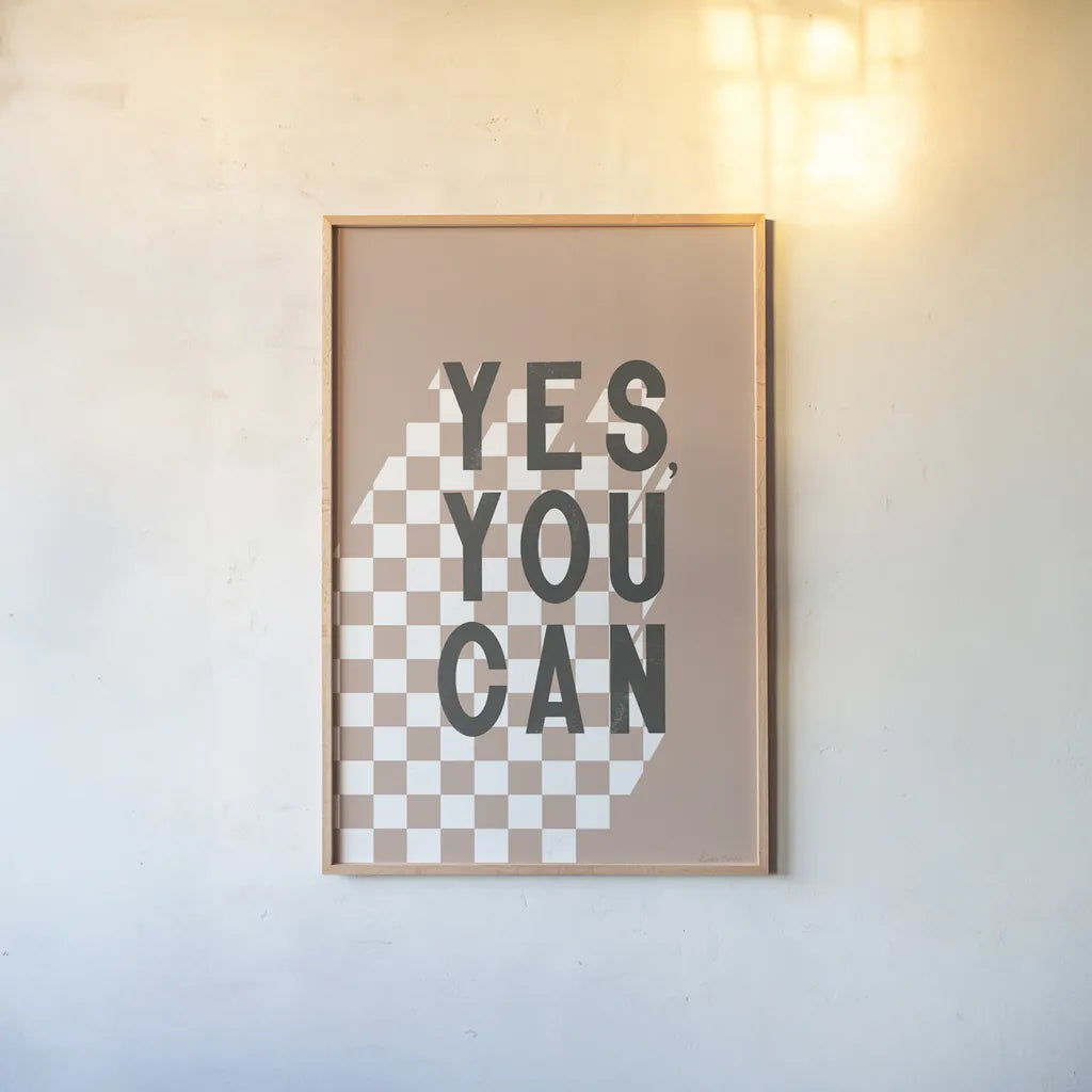 Yes You Can Checkered by Becky Thorns. shown as a paper print in a natural frame. Available as a archival giclee rolled canvas, fine art paper, or poster print. SKU 87462h.