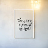 You Are Strong Black by Becky Thorns. shown as a paper print in a white frame. Available as a archival giclee rolled canvas, fine art paper, or poster print. SKU 68873h.
