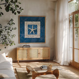 Sea Shell IV by Belinda Aldrich. Shown in a natural wood frame in a cozy modern living room. Available as an archival giclee rolled canvas, fine art paper, or poster print. SKU 32965a.