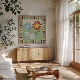Americana Garden II with border by Beth Grove. Shown in a natural wood frame in a cozy modern living room. Available as an archival giclee rolled canvas, fine art paper, or poster print. SKU 27289a.