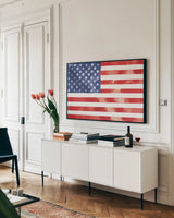 Americana Style Flag II by Beth Grove. shown as a framed stretched canvas in a living room above a console. Available as a archival giclee rolled canvas, fine art paper, or poster print. SKU 79934i.