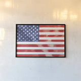 Americana Style Flag II by Beth Grove. shown as a paper print in a black flame. Available as a archival giclee rolled canvas, fine art paper, or poster print. SKU 79934i.