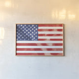 Americana Style Flag II by Beth Grove. shown as a paper print in a natural frame. Available as a archival giclee rolled canvas, fine art paper, or poster print. SKU 79934i.
