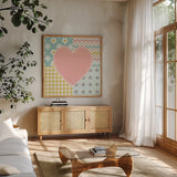 Baby Quilt I by Beth Grove. Shown in a natural wood frame in a cozy modern living room. Available as an archival giclee rolled canvas, fine art paper, or poster print. SKU 24660a.