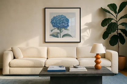 Blue Hydrangea III Light by Beth Grove. Displayed in a glass frame with matte in a clean modern living room. Available as an archival giclee rolled canvas, fine art paper, or poster print. SKU 21476a.