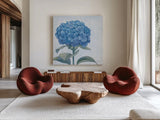 Blue Hydrangea III Light by Beth Grove. Shown as extra-large giant wall art in a modern living room. Available as an archival giclee rolled canvas, fine art paper, or poster print. SKU 21476a.